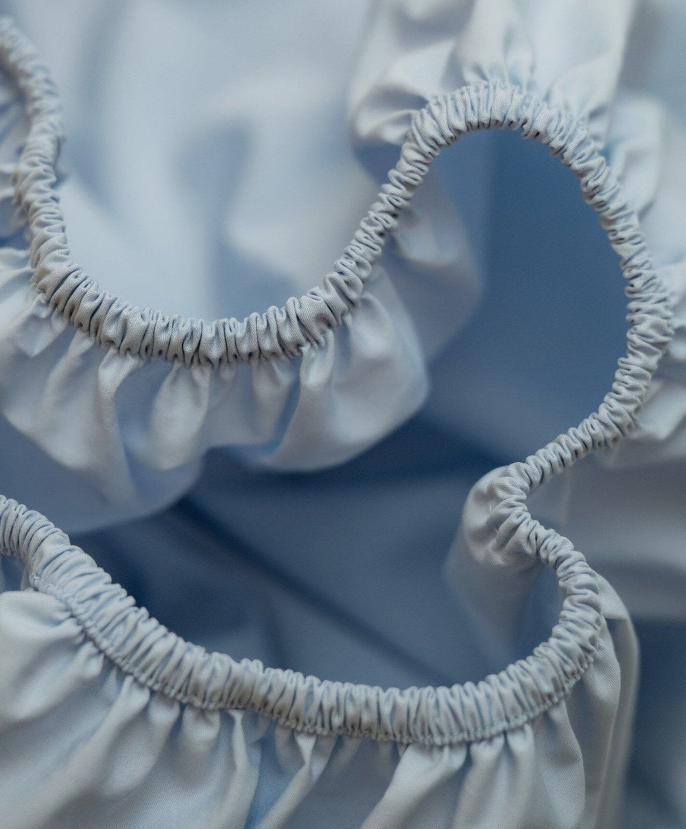 Percale Sheet Set by Fable Home, shown in Meadow Blue.
