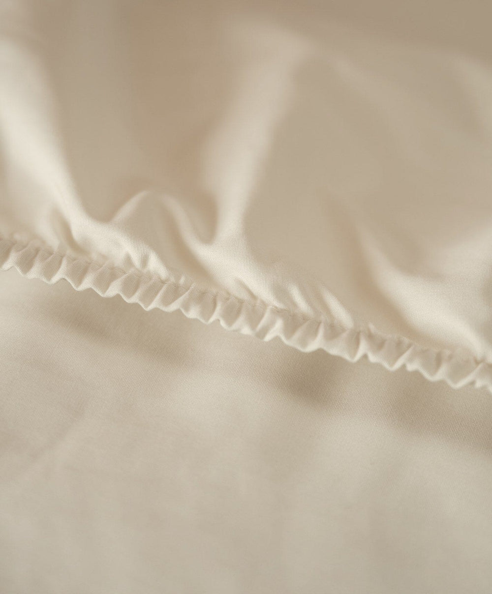 Percale Sheet Set by Fable Home, shown in Birch Sand.