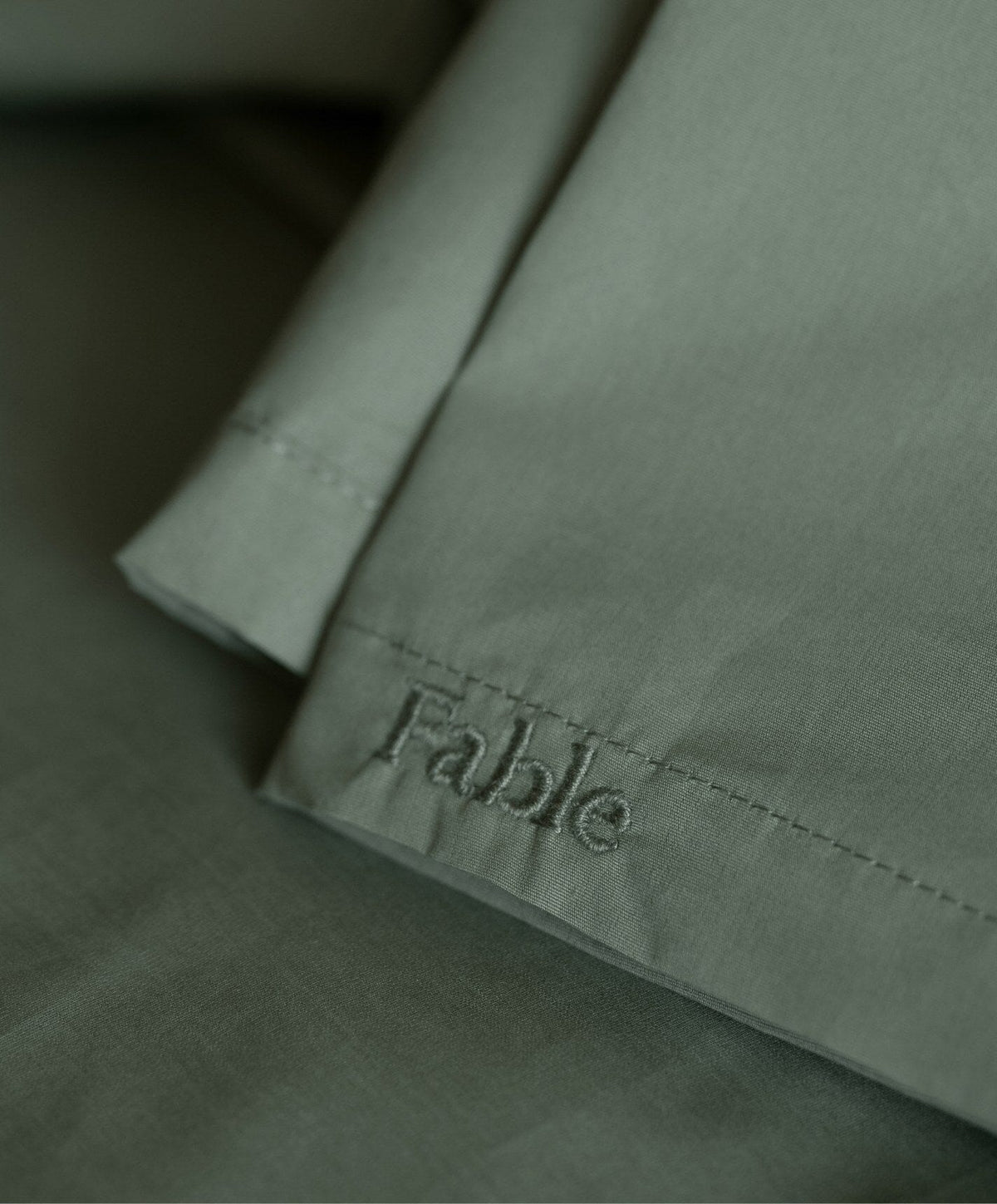 Percale Sheet Set by Fable Home, shown in Juniper Green.
