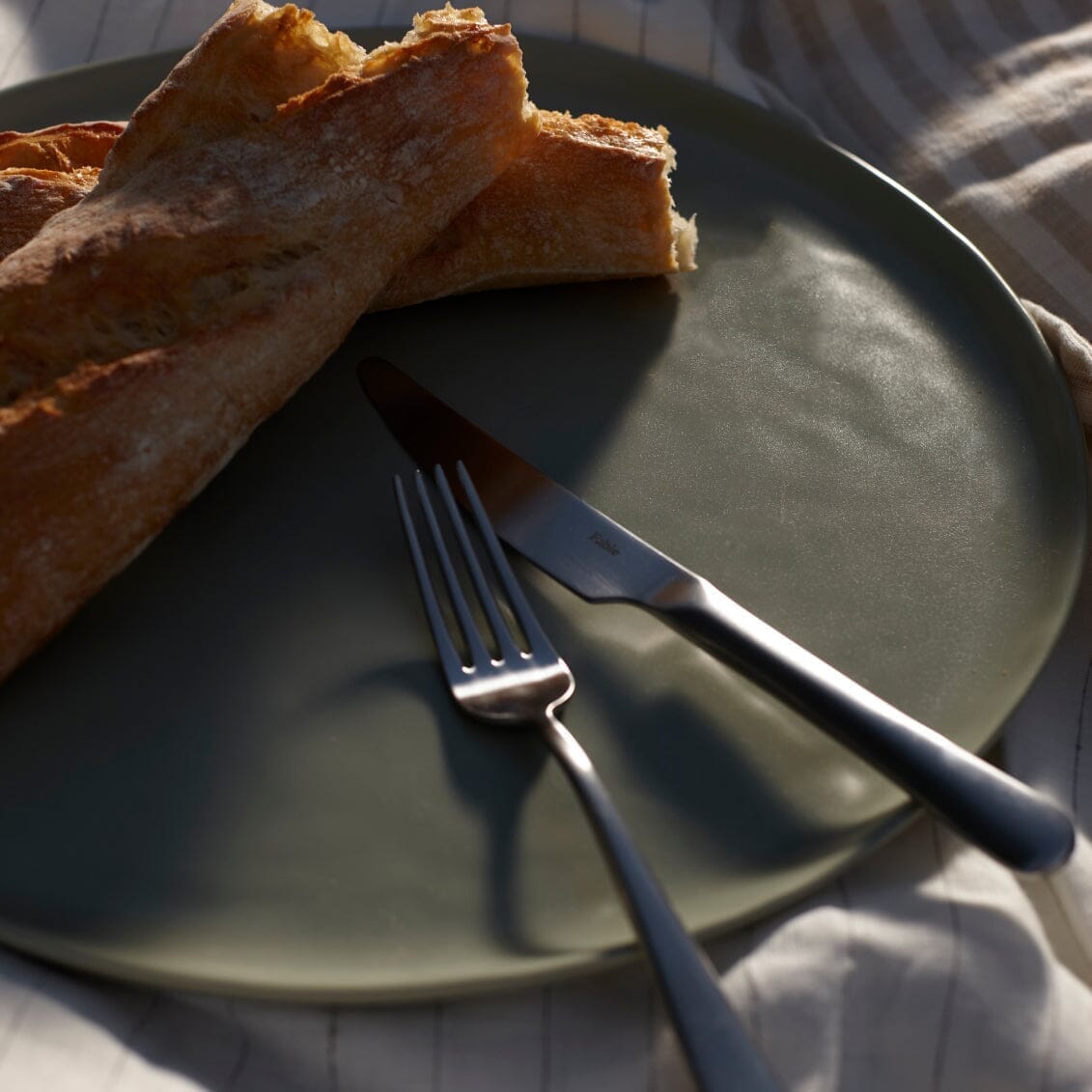 Serving platter dinnerware by Fable Home, shown in a beachgrassgreen finish.