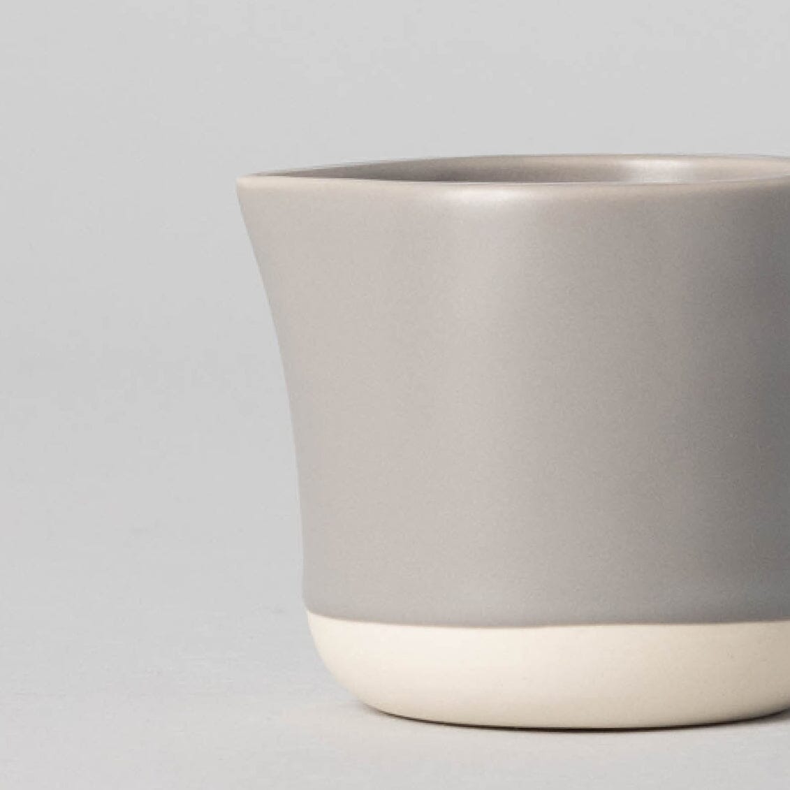 Small carafe drinkware by Fable Home, shown in a dovegray finish.