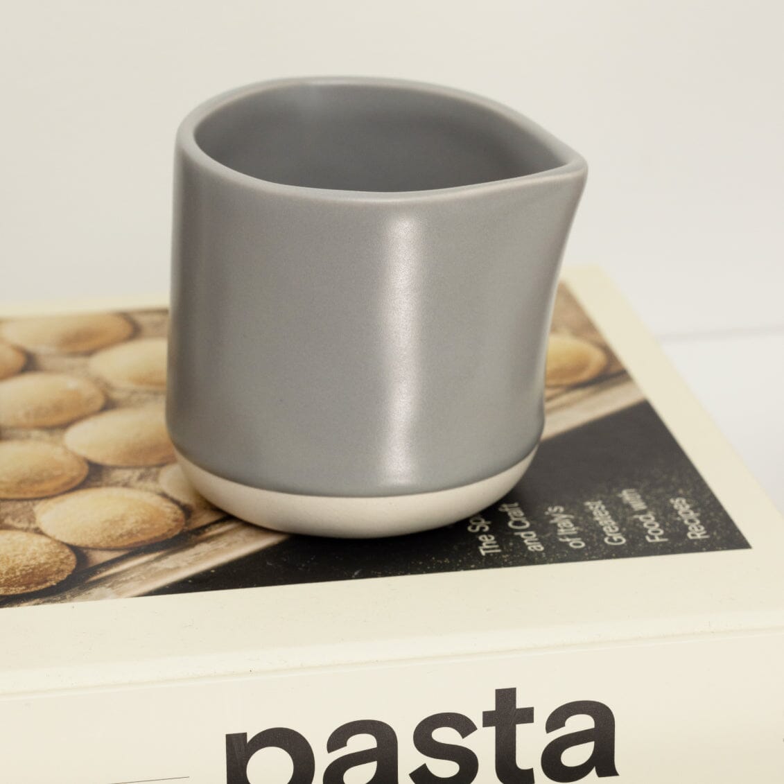 Small carafe drinkware by Fable Home, shown in a dovegray finish.
