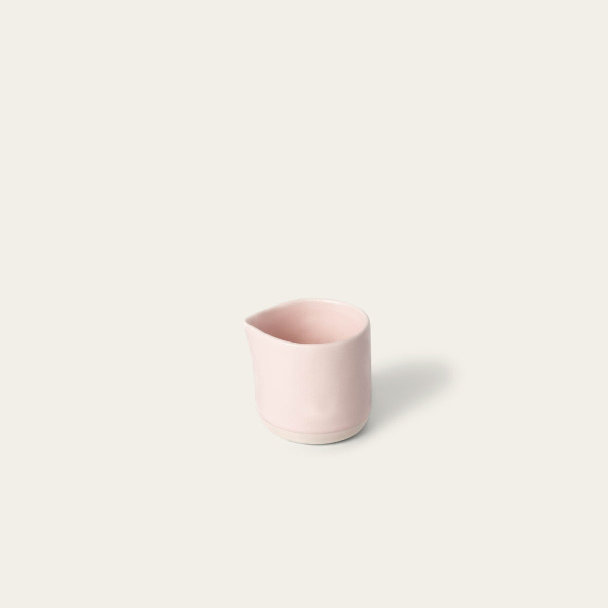 Small carafe drinkware by Fable Home, shown in a blushpink finish.