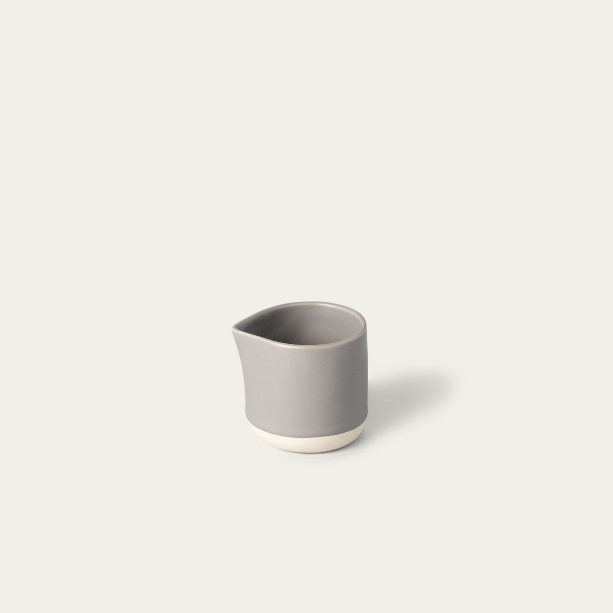Small carafe drinkware by Fable Home, shown in a dovegray finish.